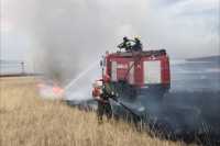 Частные дома и большой степной пожар тушили пожарные в Хакасии