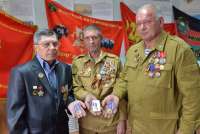 В военном комиссариате Хакасии вручили награды четверым воинам-афганцам
