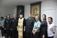 В хакасской службе судебных приставов освятили икону Феодора Стратилата