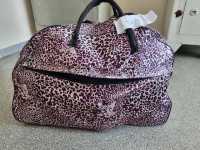 Владелица леопардовой сумки, которую в Хакасии искали три недели, объявилась сама