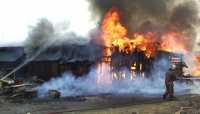 В Хакасии из-за золы загорелась постройка