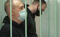 Экс-чиновник Хакасии Владимир Бызов (на переднем плане) признан виновным в многочисленных взятках и мошенничестве. 