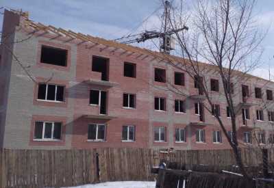 Когда в Черногорске достроят дом для переселенцев из аварийного жилья?