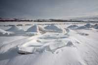 Ледяные норы на море показала фотограф из Хакасии