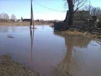 Вода в селе в Красноярском крае, где подтоплено около 250 домов, пошла на спад