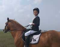 Воспитанница дома-интерната приняла участие в соревнованиях по адаптивному конному спорту