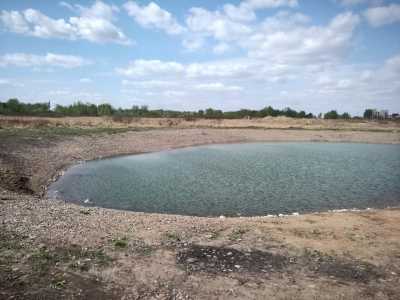В новом районе Абакана появился большой пруд